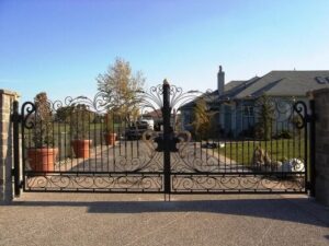 Elegant wrought iron gate with decorative scrollwork and luxury estate driveway design G121 MCD