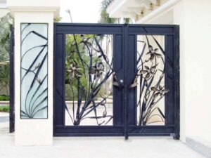 Artistic wrought iron gate with floral branch and botanical iron detailing G131 MCD