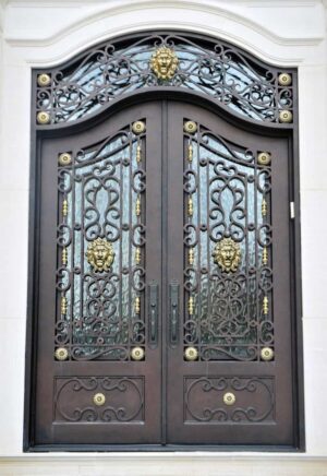 Double wrought iron door EL1136 MCD with ornate scrolls, rosettes, and embossed panels, hand-forged for strength.