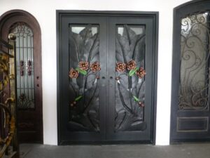 Artistic wrought iron door EL1137 MCD with custom forged floral motifs, handcrafted for unique luxury strength.