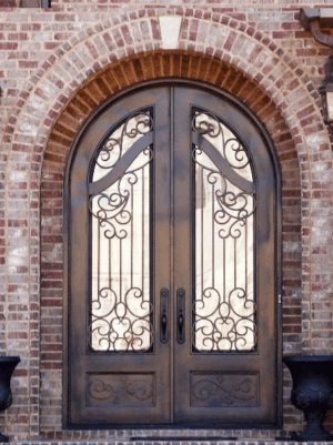 Double arched wrought iron door EL1104 MCD with ornate scrollwork and patina finish, hand-forged for secure luxury.