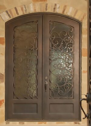 EL2085 MCD arched double wrought iron door with vine scrollwork and insulated glass panels