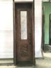 Single wrought iron door EL1086 MCD with slim glass insert and scroll base, handcrafted for elegance and security.