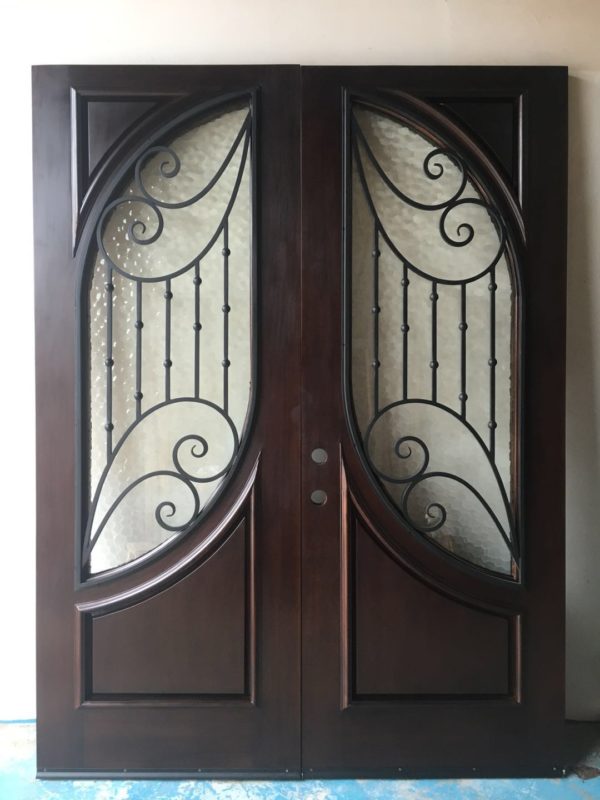 Custom Hand-Crafted Door with Wrought Iron