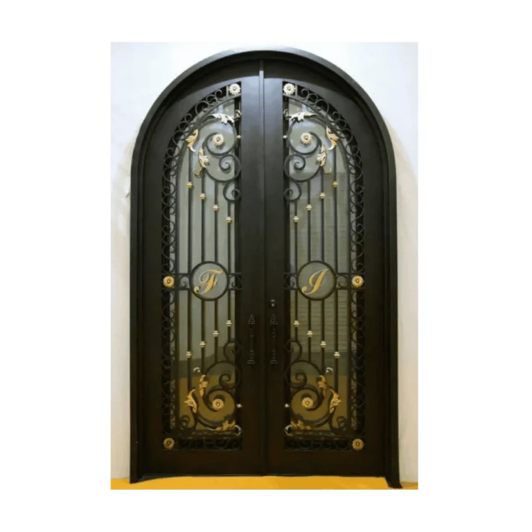 Double wrought iron front entry door with decorative scrollwork and glass panels installed in a luxury home entrance