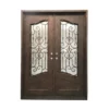 Ornate wrought iron door EL1180 MCD with wood-tone finish and scrollwork, crafted for luxury estates.