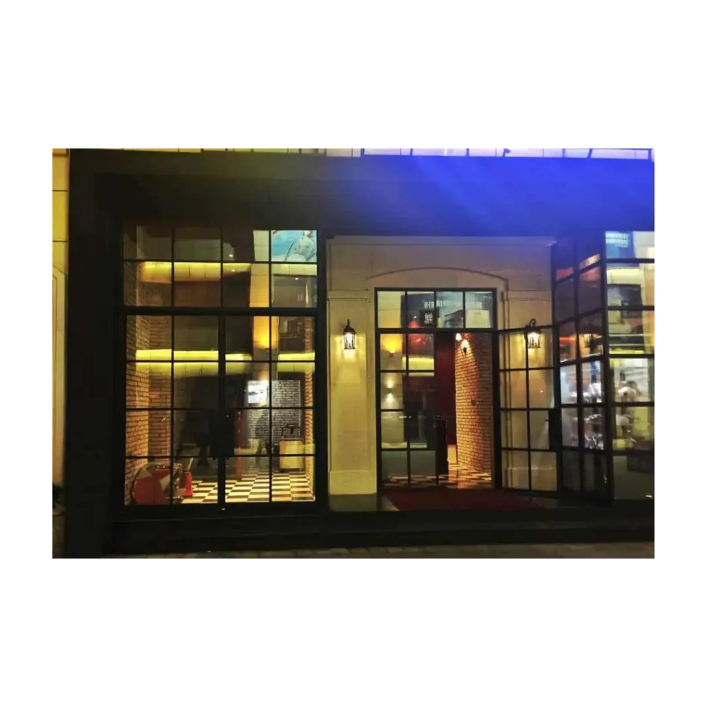 Double wrought iron door EL1025 MCD with wide modern glass panels, handcrafted for durability and contemporary elegance.