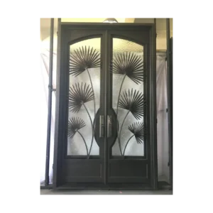 The EL1030 MCD double wrought iron entry door features artistic palm leaf motifs over textured glass, handcrafted from 12-gauge wrought iron. Built for strength, elegance, and artistry, it includes operable glass panels for ventilation and cleaning. A unique design perfect for luxury homes and estates seeking a bold, nature-inspired entryway.
