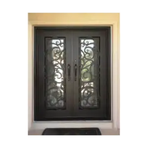 Double wrought iron door EL1036 MCD with ornate arched scrollwork and glass panels, handcrafted for elegance and strength.