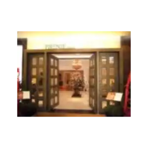 Double wrought iron door EL1038 MCD with full glass panels and ornate framing, handcrafted for elegance and strength.