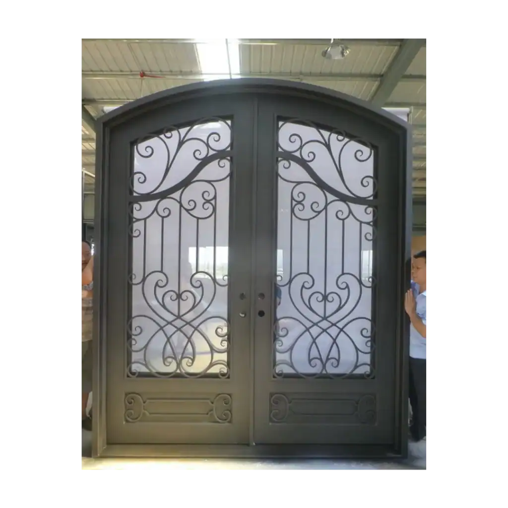 Double wrought iron door EL1058 MCD with decorative scroll panels, designed for beauty, strength, and secure entryway style.