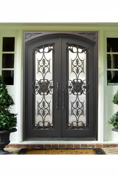 Double arched wrought iron door EL1094 MCD with ornate scrollwork and mullion details, handcrafted for luxury strength and style.