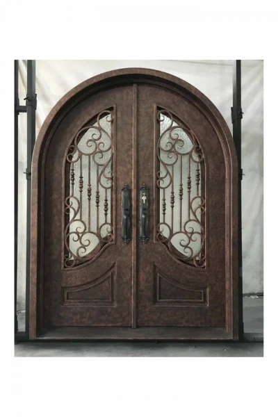 Arched custom wrought iron double door with decorative scrollwork and protective finish for rust resistance and long-term durability